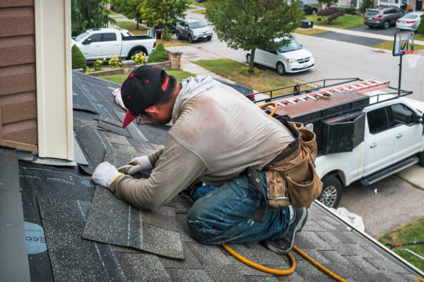 Professional Roofing technician working in Bethel, WA